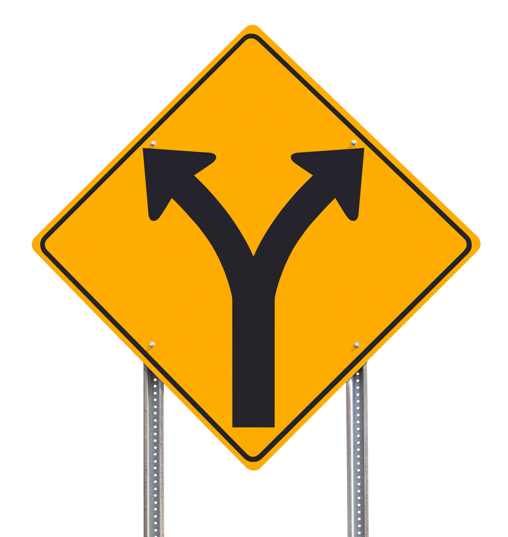 An informational traffic sign post over a white background showing a division of directions